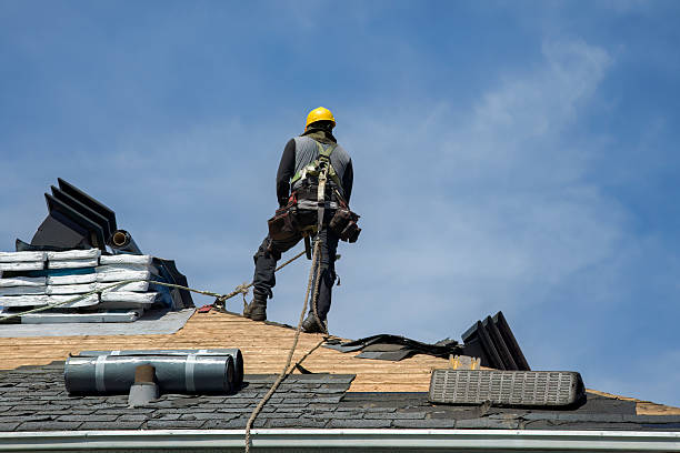 Professional Roofing technician working in Tavernier, FL